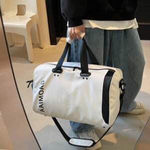 Gym and travel duffel bag with a separate compartment for wet items