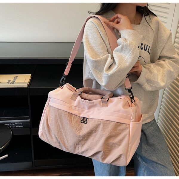 Portable waterproof travel bag with separate compartments for wet and dry items