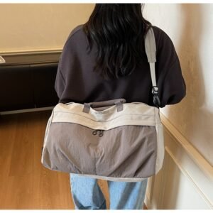 Portable waterproof travel bag with separate compartments for wet and dry items