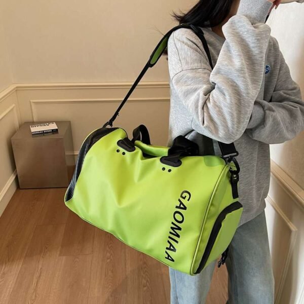 Gym and travel duffel bag with a separate compartment for wet items