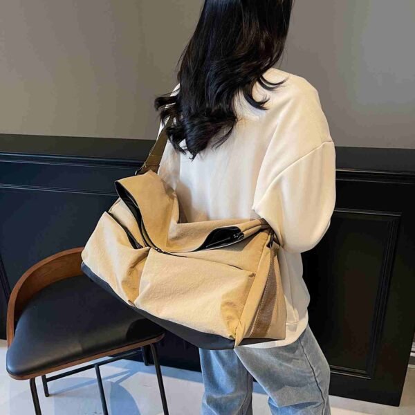 Large-capacity gym bag with separate compartments for wet and dry items