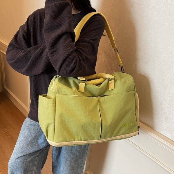 Lightweight, waterproof sports tote bag with multiple compartments