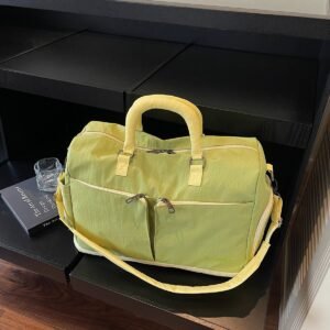 Lightweight, waterproof sports tote bag with multiple compartments