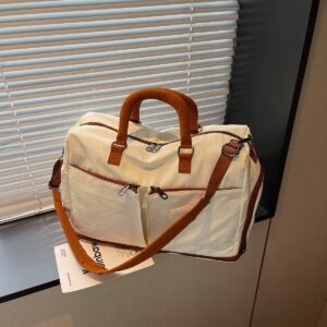 Lightweight, waterproof sports tote bag with multiple compartments