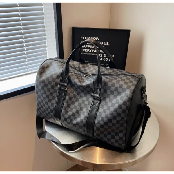 Waterproof sports and travel bag with shoe compartment